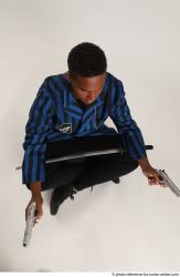 Garson SITTING POSE WITH GUNS